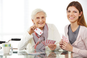 caregiver and patient playing card game